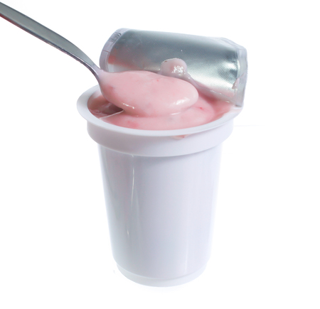 Strawberry yogurt on whiteの写真素材