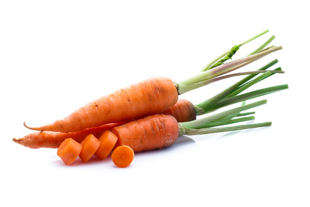 Fresh carrots isolated on whiteの写真素材