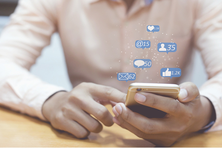 Man using smart phone ,Social media conceptの写真素材