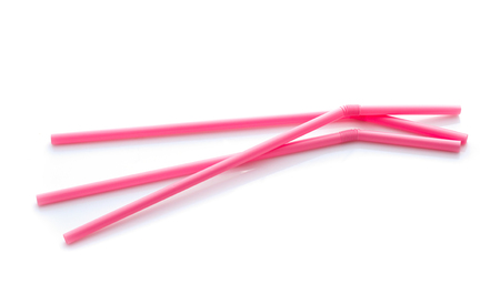 Colorful plastic drinking straws isolated over the whiteの写真素材