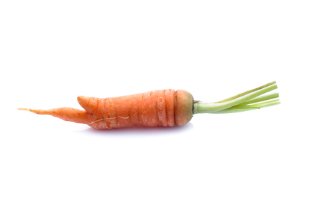 fresh carrots isolated on white backgroundの写真素材