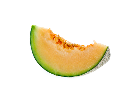 cantaloupe melon slices isolated on white backgroundの写真素材