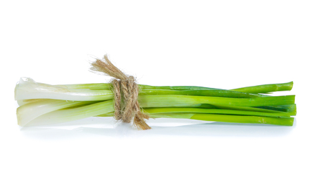Green onion isolated on the whiteの写真素材