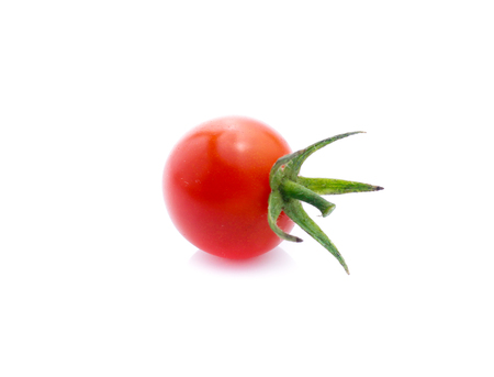 Tomatoes isolated on whiteの写真素材