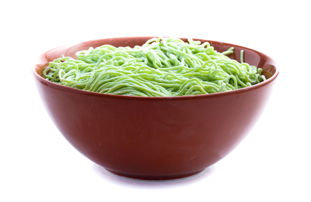 Green noodle isolated on whiteの写真素材