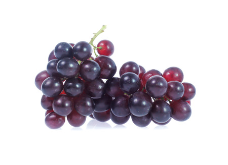Red grapes  isolated on whiteの写真素材