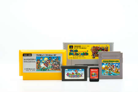 Fukuoka, Japan - June 23, 2019: different generation of Nintendo super mario bros game cartridges...