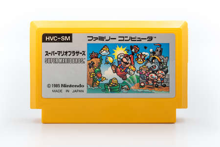 Fukuoka, Japan - June 22, 2019: different generation of Nintendo super mario bros game cartridges isolated on white backgroundのeditorial素材