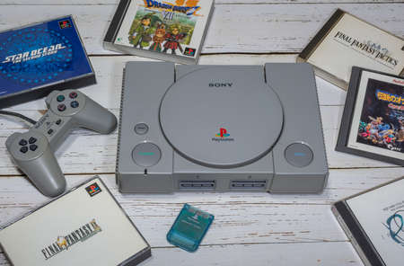 Fukuoka, Japan - October 24, 2021: the original sony playstation 32-bit home video game console released in 1994 with some games and controllerのeditorial素材