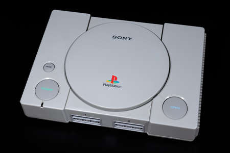 Fukuoka, Japan - October 24, 2021: the original sony playstation 32-bit home video game console released in 1994 isolated on black backgroundのeditorial素材