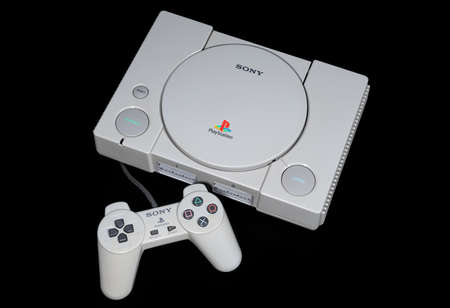 Fukuoka, Japan - October 24, 2021: the original sony playstation 32-bit home video game console released in 1994 isolated on black backgroundのeditorial素材