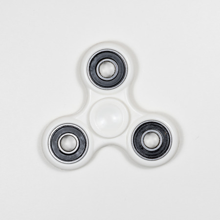 Fidget spinner on white backgroundの写真素材