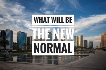 WHAT WILL BE THE NEW NORMAL text on background of Doha City. New normal after Covid-19 pandemic. Coronavirus outbreak concept.の写真素材