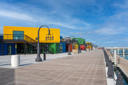 DOHA, QATAR - MARCH 9, 2021: Box Park, located at the old Doha Port, is the newest trending destination in Qatar.のeditorial素材