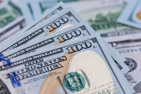 Close up of one hundred US dollar banknotes. Money background. Financial, business, investment and...