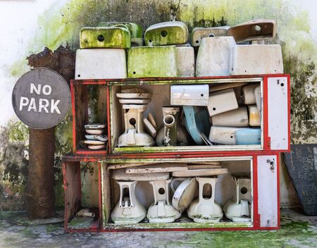 storage of abandoned damaged and broken toilets
