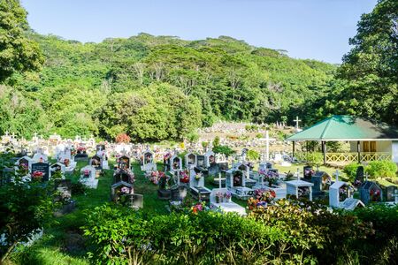 Tropical christian cemetery on La Digue island, Seychellesの写真素材