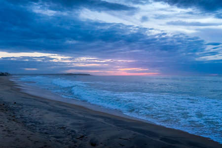 sunrise over the sea. beautiful pastel colors. cloudy sky