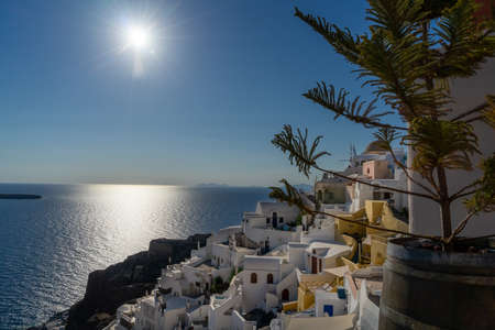 Panoramic view of Oia town in Santorini island with old whitewashed houses and traditional windmill, Greece Greek landscape on a sunny dayの写真素材