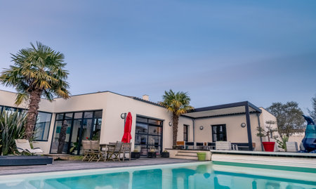 Trendy house with outdoor patio pergola shade structure, awning and patio roof, garden lounge,...