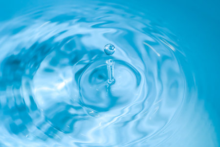 water drop splash blue colored. Round water drop. Water drops in glass. Drops, splashes, spray,...