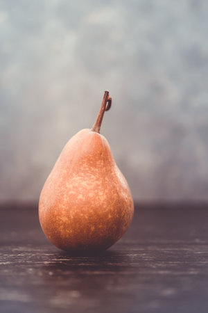 Fresh pear isolated on gray background with copy space.の写真素材