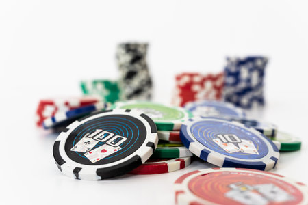 Stack of realistic chips for casino isolated on white background. Volumetric heap of money or cash...