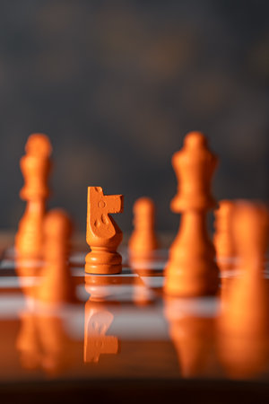 Chess pieces on a chessboard with shallow depth of field.の写真素材