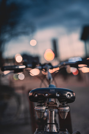 bicycle in the city at night with bokeh light.の写真素材