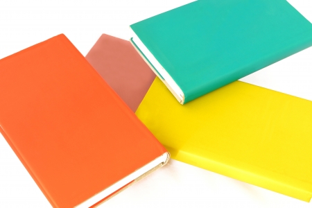 A stack of books on white background