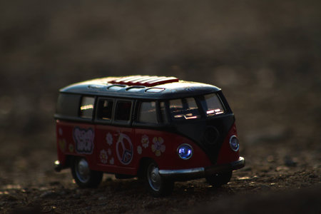 Toy bus at sunsetの写真素材