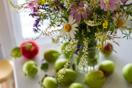 Vase with flowers and apples 1