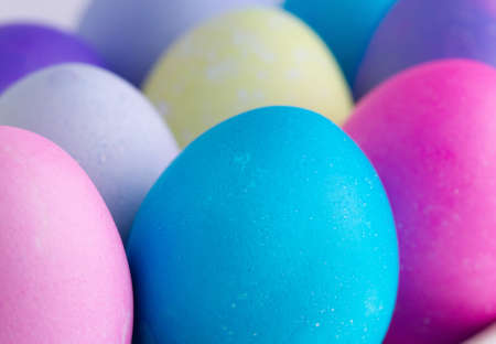 Colored painted chicken eggs for easter, close-up