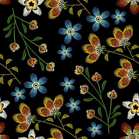 Cornflowers embroidery seamless pattern. Beautiful spring flowers on black background. Classical embroidery fashionable template for design of clothesのイラスト素材