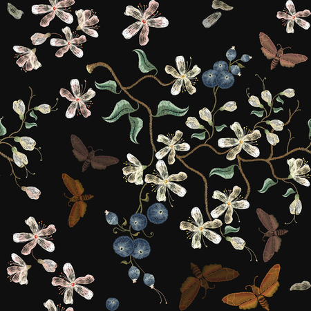 Embroidery flowers, blooming cherry and butterflies seamless pattern. Sakura bloom embroidery. Beautiful flowers of cherry and machaons seamless patternのイラスト素材