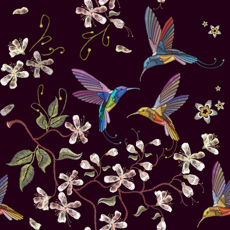 Humming bird and blossoming cherry embroidery seamless pattern. Beautiful hummingbirds and white blossoming cherry sakura flowers on black background template for clothes, textiles, t-shirt designのイラスト素材