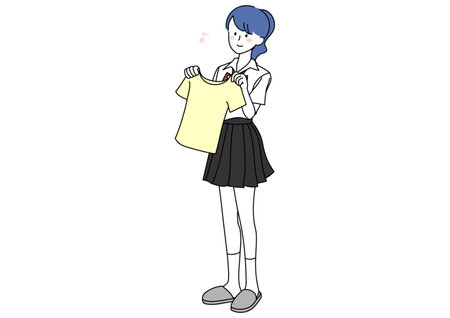 Clip art of high school girl choosing a shirtのイラスト素材