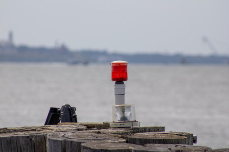 Red light on a pier in the harbor of Rotterdam, Holland