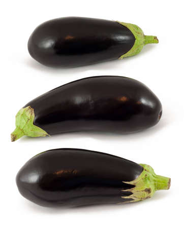 Three Aubergines isolated on a white backgroundの写真素材