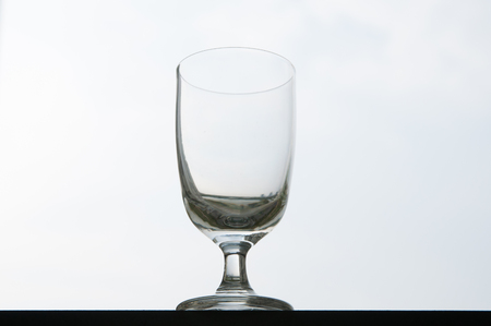 Empty wine glass on white backgroundの写真素材