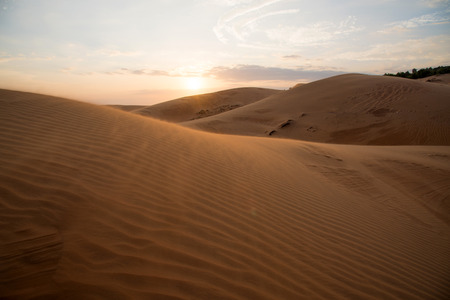 Sunset at Red sand dune in Mui-Ne city, Vietnam.の写真素材