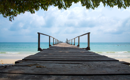 Wooden bridge into the sea at Samed Thailandの写真素材