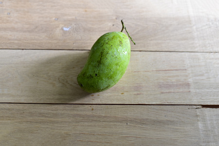 Mango on wood table.の写真素材