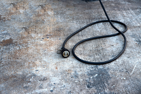 Plug and wire, electric cable on floor