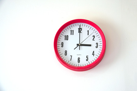 Wall clock isolated on white background at tree o'clock
