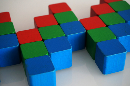 RGB red green blue wooden toy blocksの写真素材