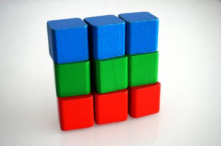 RGB red green blue wooden toy blocksの写真素材