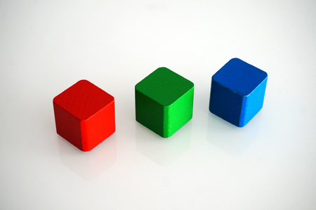 RGB red green blue wooden toy blocksの写真素材