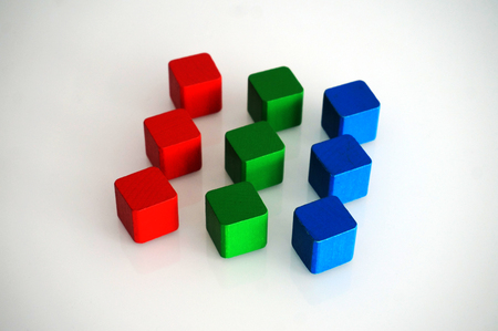 RGB red green blue wooden toy blocksの写真素材