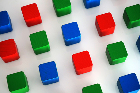 RGB red green blue wooden toy blocksの写真素材